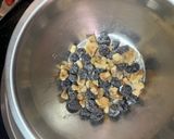 A picture of step 1 of English breakfast(whole wheat blueberry walnut muffin omelette airfried beans and cucumber juice).