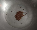 A picture of step 2 of Dry chana massala.