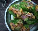 A picture of step 3 of Tangy Bitter gourd(Karela) stuffed with mango.