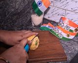 A picture of step 6 of Kesariya tri-colour mawa roll.