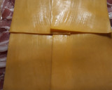 Foto del paso 3 de la receta: Tronco de lomo relleno de panceta, queso cheddar y espárragos