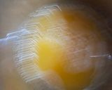 A picture of step 1 of Strawberry orange twister.