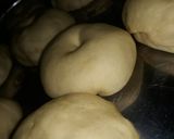 A picture of step 1 of Doughnut coated in sugar.