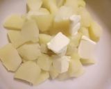 A picture of step 3 of Roasted garlic and parsley mash.