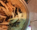 A picture of step 8 of Hot and Sour Soup with Tofu and Bamboo Shoots.