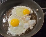 A picture of step 3 of Cheddar Grits Breakfast Bowl.