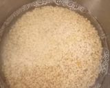 A picture of step 1 of Double tadka lahsuni Urad Dal.