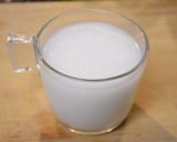 A picture of step 3 of Coconut milk rice.