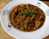 A picture of step 3 of Green chana potato curry.