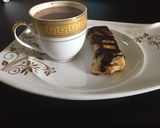A picture of step 4 of Cocoa drink served with pie.