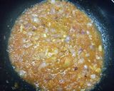 A picture of step 4 of Cheesey spiral Pasta in red sauce.