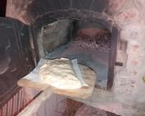 Foto del paso 5 de la receta: Pizza o pan relleno al horno de barro