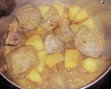 A picture of step 2 of Fried taro/potatoes rice#mycreativearrowrootrecipecontest#.