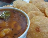 A picture of step 8 of Kachori with allu ki bhaji.