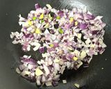 A picture of step 2 of Egg Kothu Parotta.