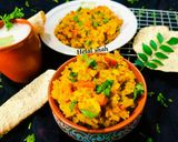 A picture of step 11 of Kathiyawadi Masala Khichdi.