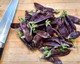 A picture of step 4 of Warm carrot, mangetout and coriander salad.