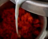A picture of step 1 of Mawa Malai Gajar Halwa.