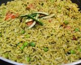 A picture of step 9 of SPINACH RICE with PEAS..