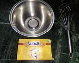 A picture of step 1 of Butterscotch rajbhog ice-cream chocolate cake.