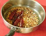 A picture of step 4 of Ellu satham (ellorai in Tamil)-Rice cooked with sesame seed masala powder.