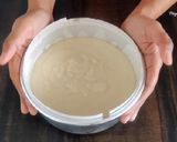 A picture of step 5 of Eggless Vanilla Sponge Cake.