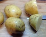 Foto del passaggio 1 della ricetta Patate intere in microonde