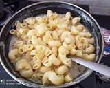 A picture of step 4 of Macaroni in Mushroom and bell pepper sauce.