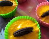 A picture of step 5 of Oreo pudding cake.