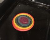 A picture of step 5 of Rainbow flower cake.