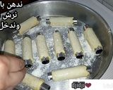صورة لخطوة 3 من وصفة سيقار محشي بموس الدجاج