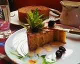 A picture of step 7 of Maize Malva Pudding drizzled with custard.