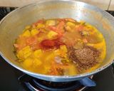 A picture of step 4 of Kerala Style Raw Banana Curry.