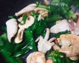 A picture of step 2 of Pad See Ew with Seafood.