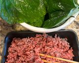 A picture of step 1 of Beef Wrapped in Betel Leaves.