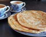 A picture of step 6 of Tea with crispy laccha paratha.