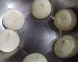 A picture of step 7 of Moong dal paratha Moong dal ki puran puli Pesarapappu bobbatlu.