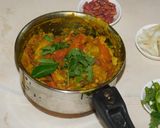 A picture of step 6 of Lunch is served: South Indian Thali with Potato Masala puri, Kidney Beans Koottu, and Green Chutney.