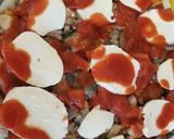 A picture of step 8 of Layered Chicken, mushroom and Parma ham bake 😀.