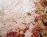 A picture of step 9 of Thai style fried rice with pineapple.