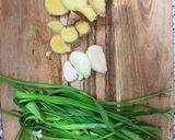 A picture of step 1 of Hainanese chicken and udon noodle broth.