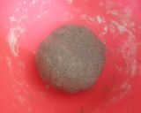 A picture of step 3 of Manipuri Chak hao tal / black rice poori.