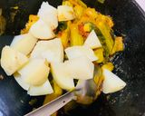 A picture of step 4 of Muniga badi jhola (Drumsticks & sun dried lentil dumplings).