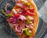 A picture of step 11 of Capsicum Onion Cheese Pizza.