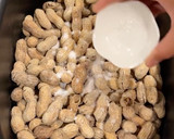 A picture of step 2 of Slow Cooker Pickle Juice Boiled Peanuts.