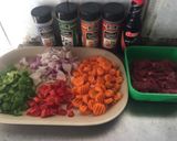 A picture of step 1 of Stir fried Potato, vege & meat.