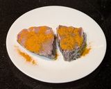 A picture of step 1 of Bhetki Maacher sorshe jhal (Bhetki Fish cooked in mustard gravy).