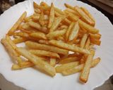 A picture of step 4 of Crispy masala fries.