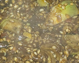 Foto del paso 6 de la receta: Arroz meloso de alcachofas y conserva de pota en su tinta