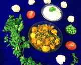 A picture of step 8 of Cauliflower Peas Curry.